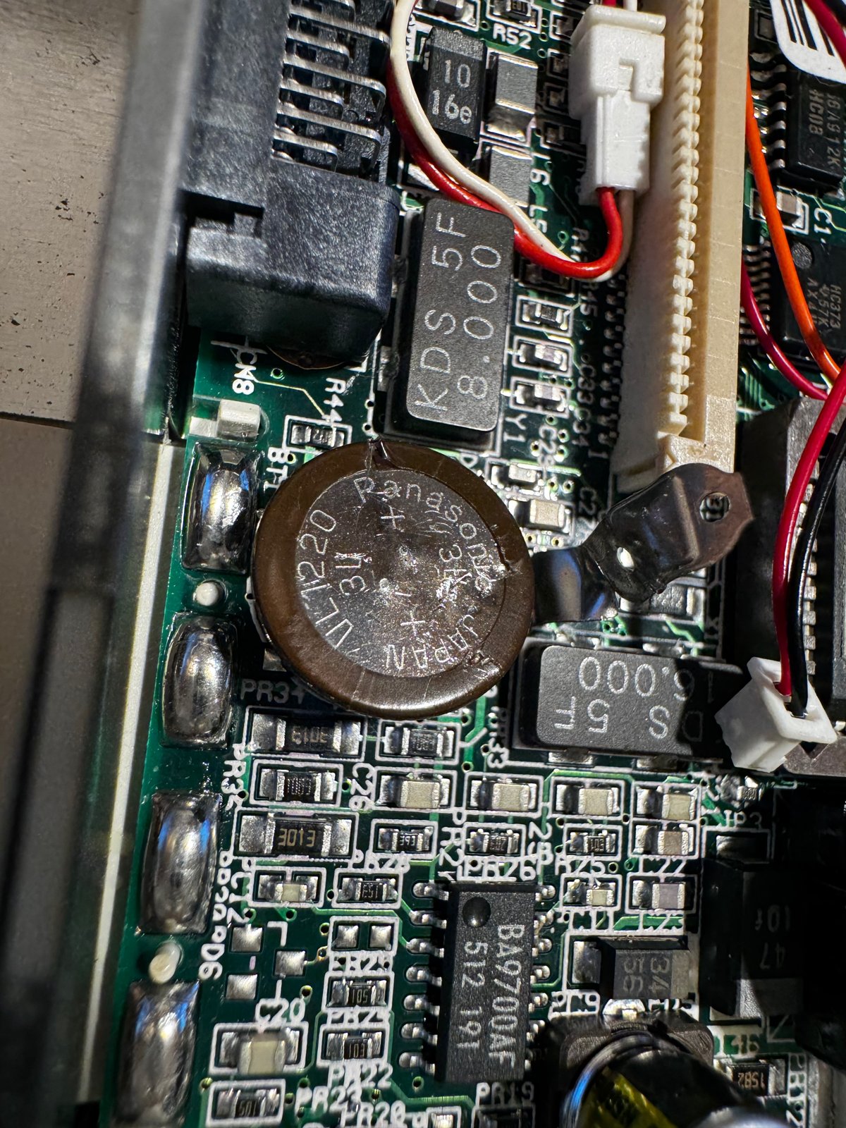 The Panasonic VL1220 CMOS battery on the mainboard