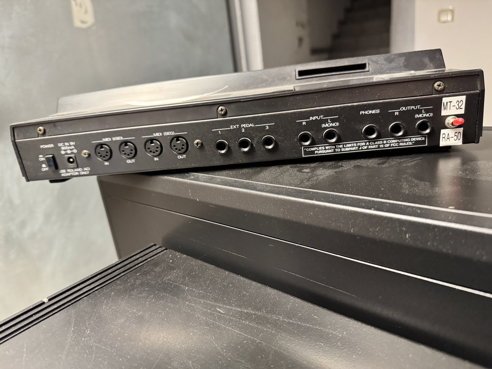 The back of the RA-50: MIDI IN/OUT, the 6.3 mm audio outputs and the MT-32/RA-50 switch The back of the RA-50: MIDI IN/OUT, the 6.3 mm audio outputs and the MT-32/RA-50 switch